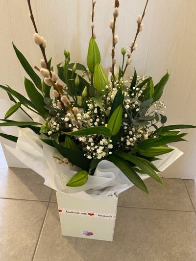 Pure Joy - A contemporary handie in whites and greens making this beautiful bouquet a perfect gift